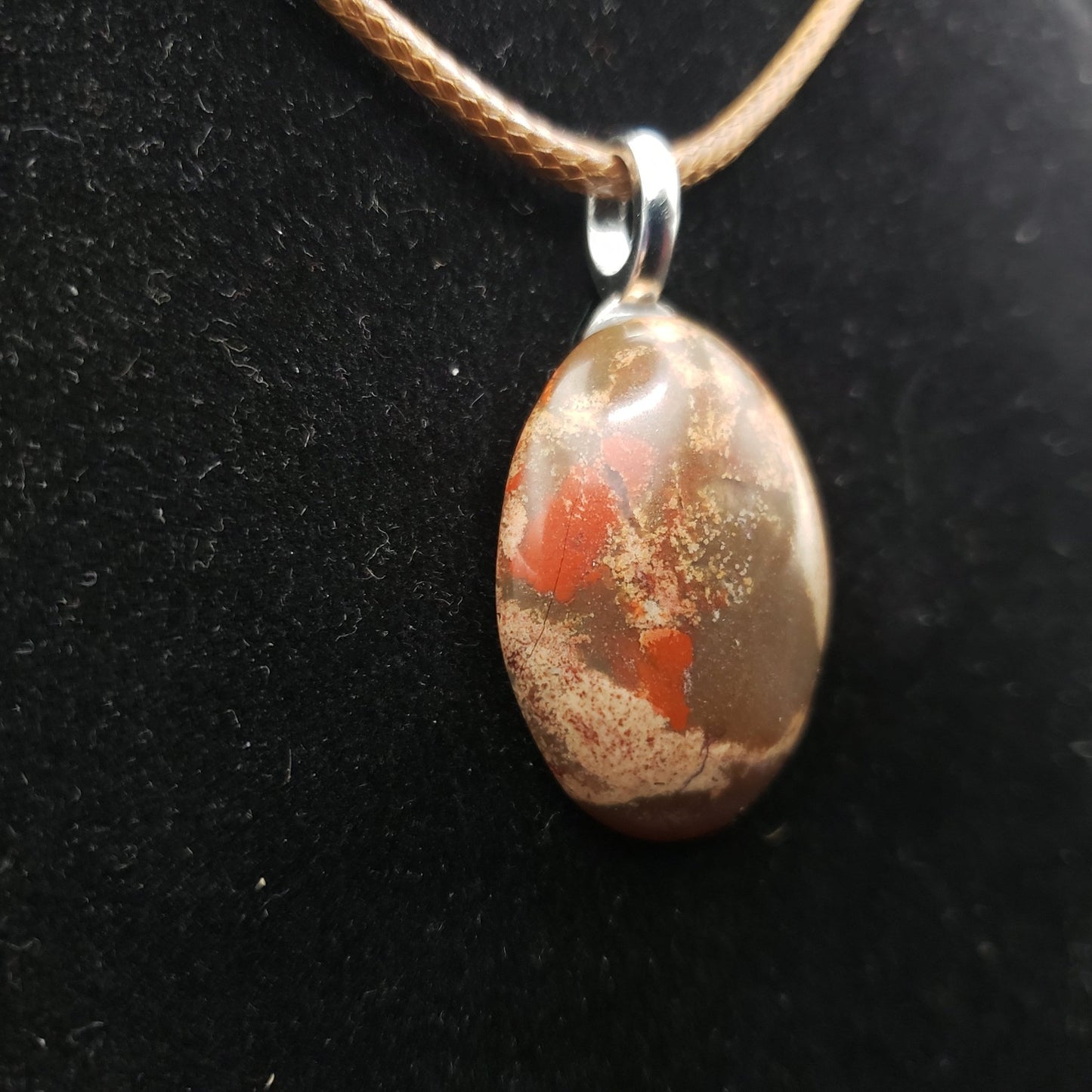 Red, Browns and Beige Ocean Jasper Agate 1 1/4" Oval Stone Pendant Necklace on a 17" long brown cord (CJ00033) Simply CBD LLC